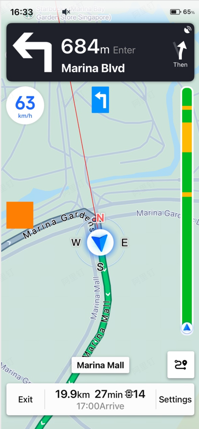 AMAP turn-by-turn navigation in Singapore — upcoming left turn onto Marina Blvd in 684m, current speed 63 km/h, ETA 17:00 (27min remaining), with real-time traffic and route progress bar.