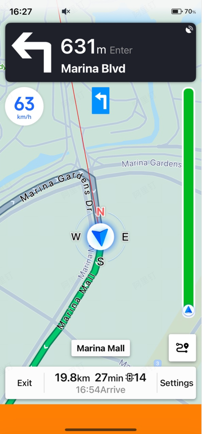 AMAP turn-by-turn navigation in Singapore — upcoming left turn onto Marina Blvd in 631m, current speed 63 km/h, ETA 16:54 (27min remaining), with real-time traffic and route progress bar.