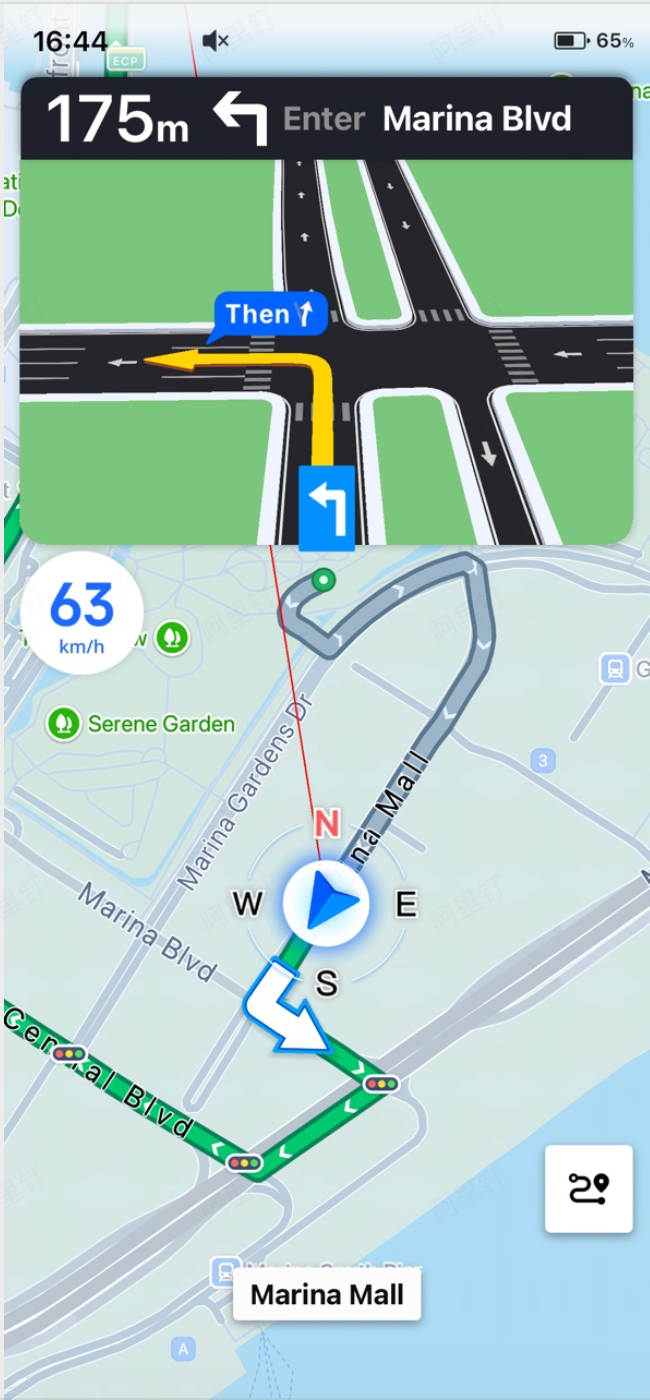 Real-time navigation view showing the current vehicle position, next turn instruction, traffic status, and estimated arrival time on an AMAP map