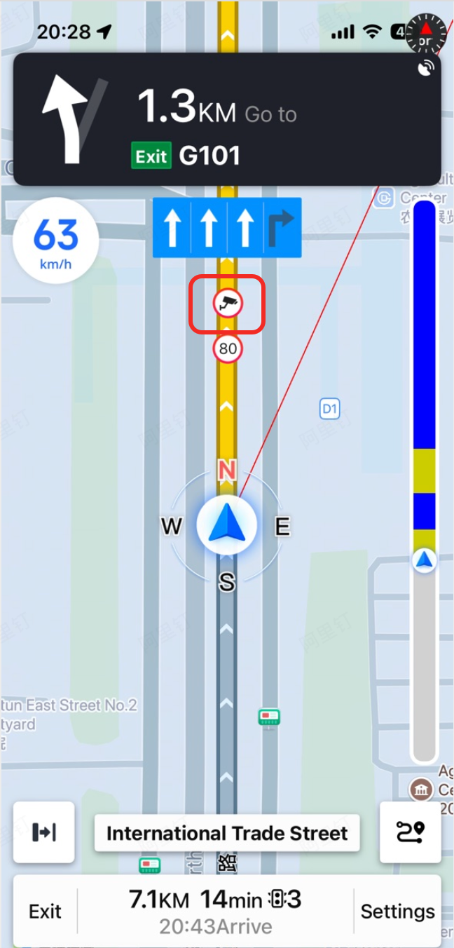 Camera information overlay displaying an upcoming speed camera with distance countdown and speed limit on the route
